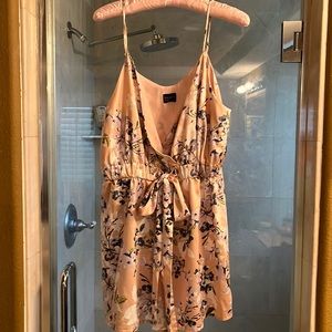 Free Press, play suitw/ silky fabric and lined at top